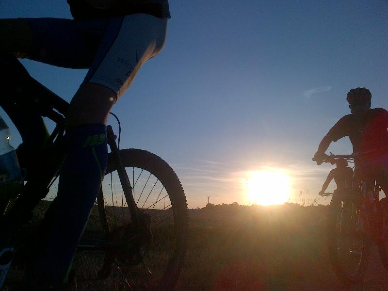 Sonne mit Radlern