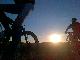 Sonne mit Radlern